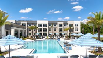 Resort style pool with tanning ledge & sundeck